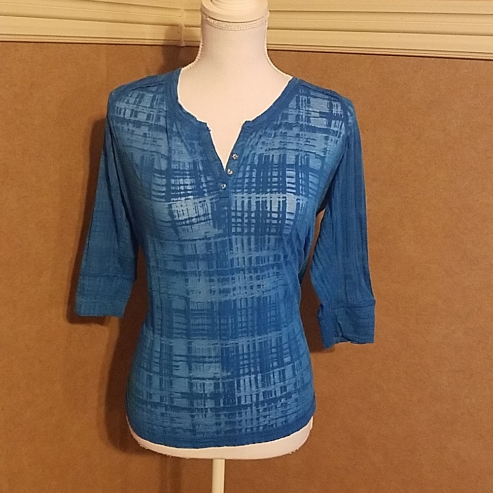 Women's bright blue V neck top. 3/4 length sleeve
